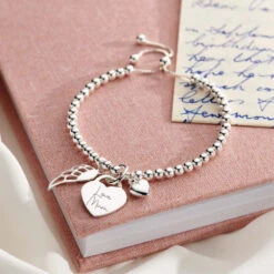 Inscripture -Inscripture Duo Angel Wing Handwriting 1000x1000 1